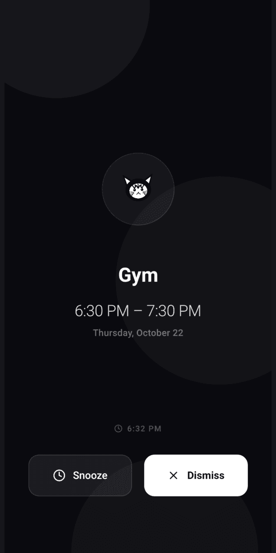 Full-screen event alarm with Snooze and Dismiss